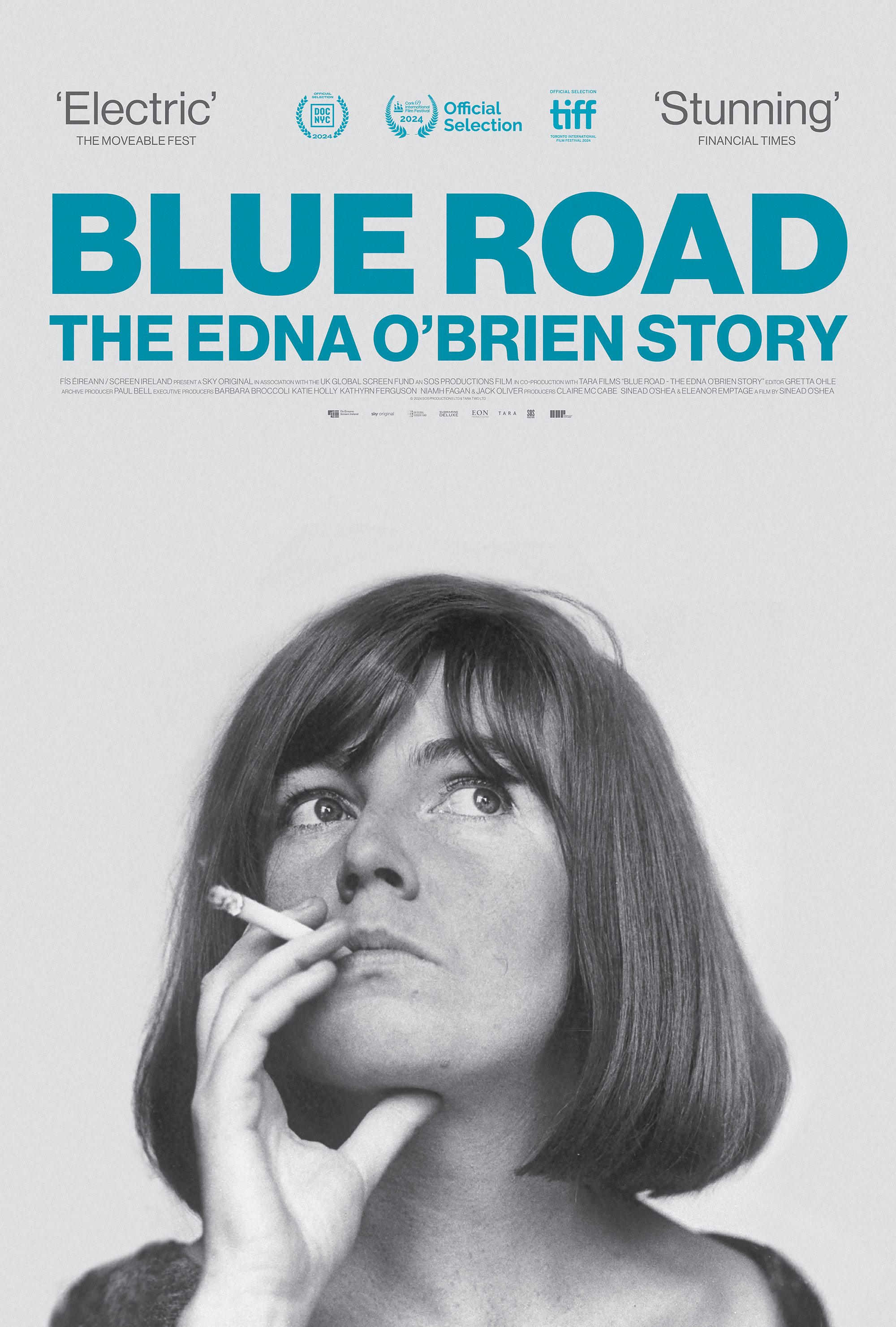 Text on poster: “Blue Road: The Edna O’Brien Story.” The image shows a black-and-white portrait of a woman holding a cigarette.
