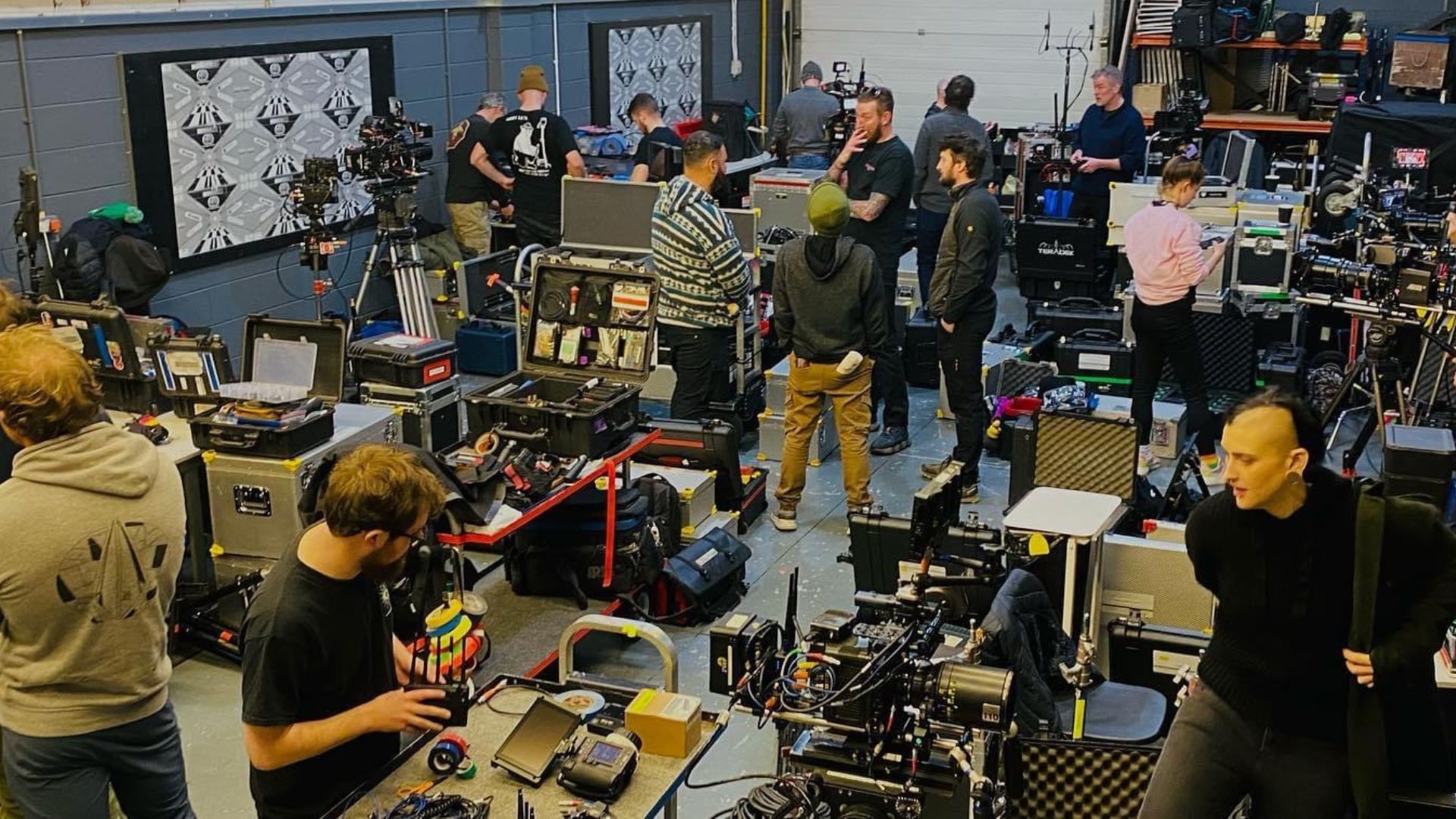 Crew prepping equipment for principal photography