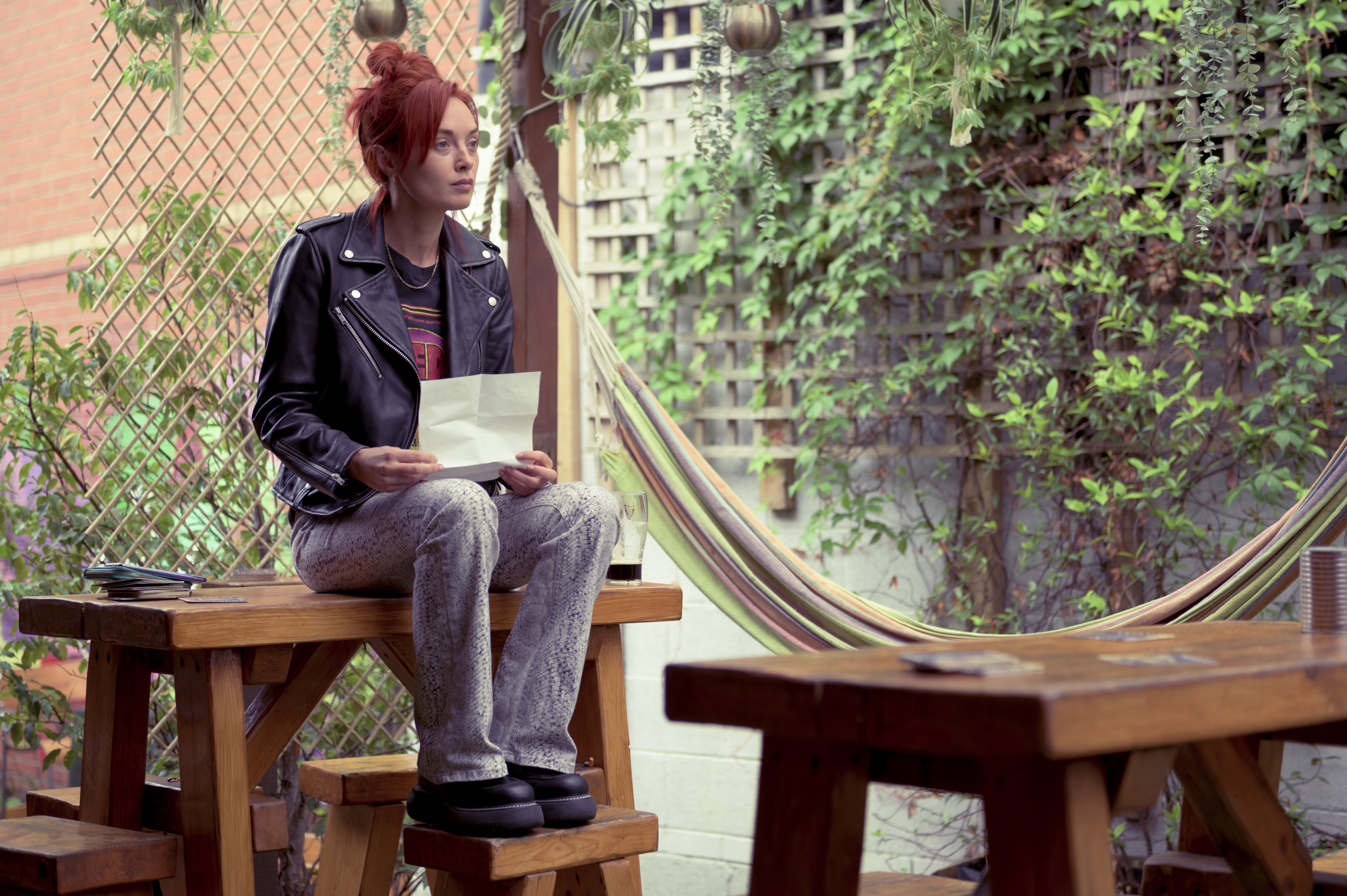 Elva Trill as Áine.